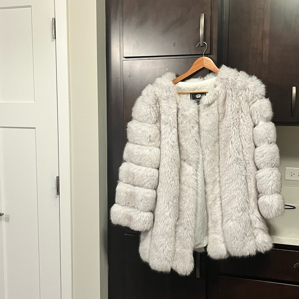 White faux fur coat